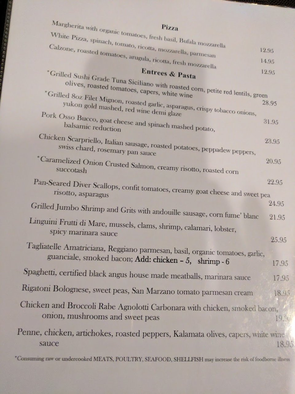 Restaurant menu with lunch items and sodas.